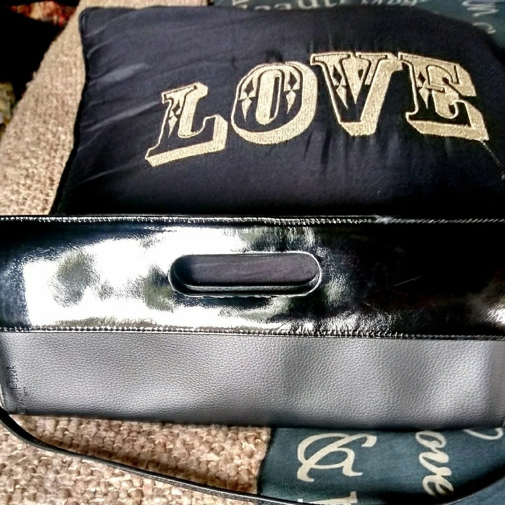 Cleo & Patek black leather clutch